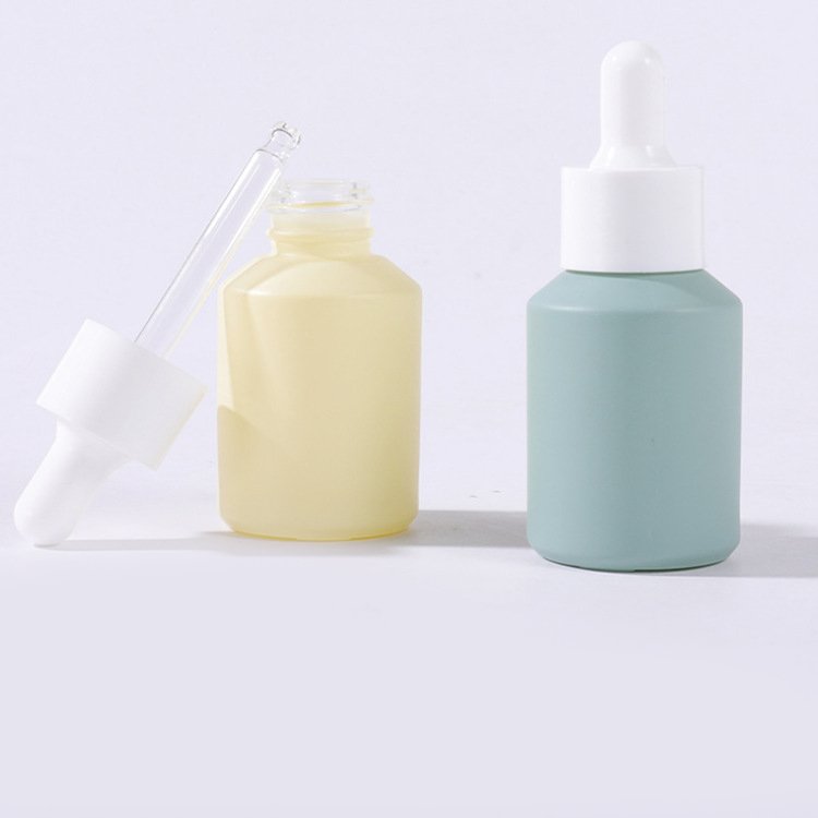 Flat shoulder cylinder shape white pink blue purple skin care serum bottle 30ml glass dropper bottle