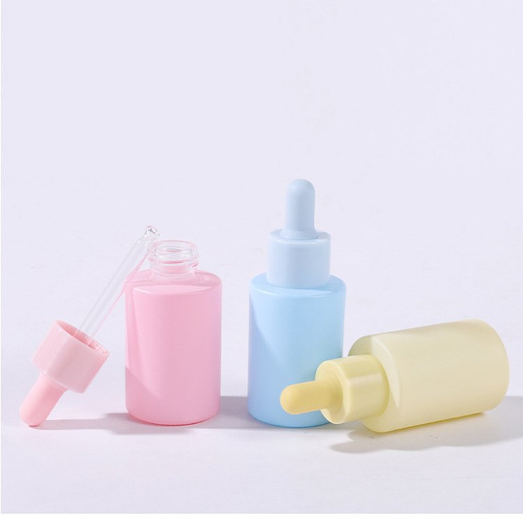 Flat shoulder cylinder shape white pink blue purple skin care serum bottle 30ml glass dropper bottle