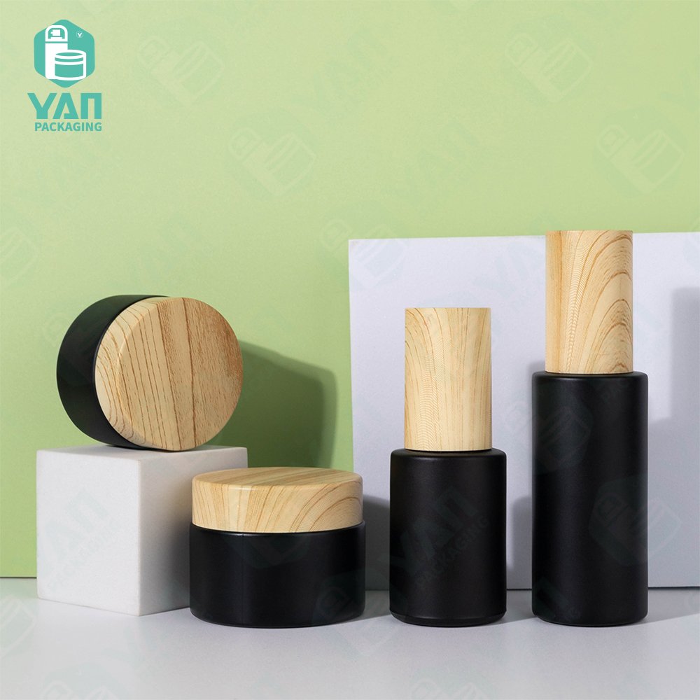 YAN Packaging black matt glass serum 30ml 50ml bottle jar water transfer plastic lid for cosmetic