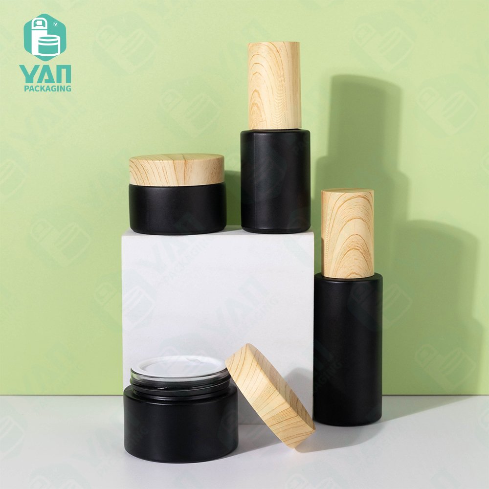 YAN Packaging black matt glass serum 30ml 50ml bottle jar water transfer plastic lid for cosmetic