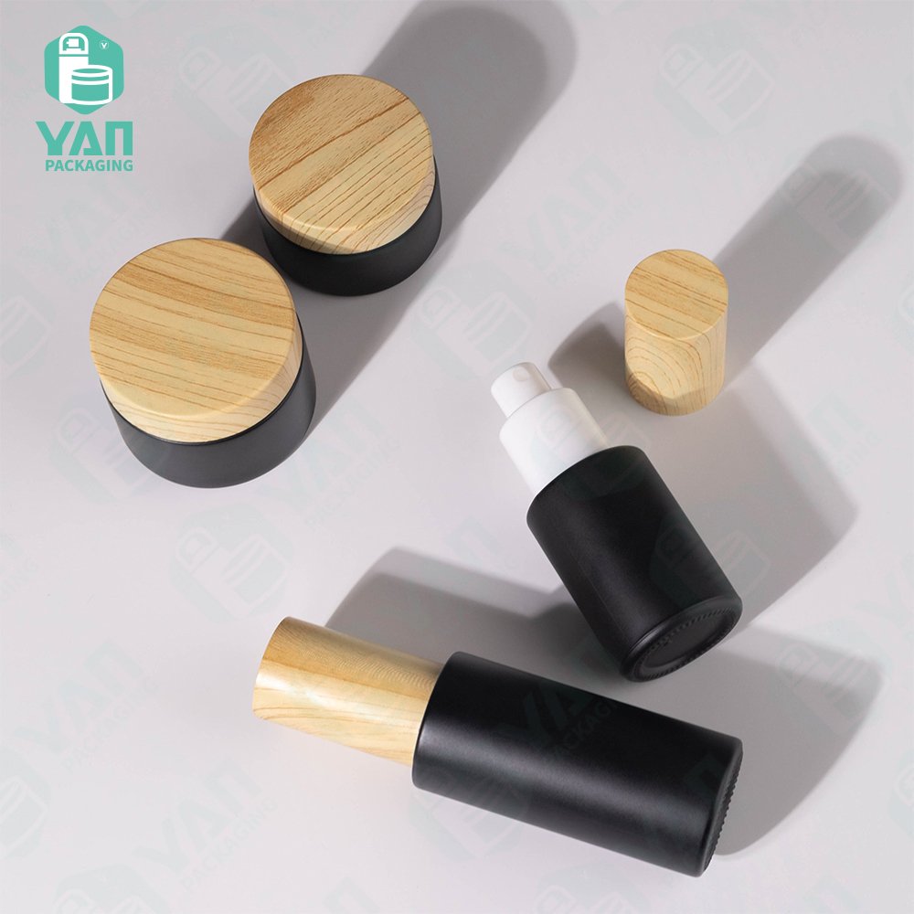 YAN Packaging black matt glass serum 30ml 50ml bottle jar water transfer plastic lid for cosmetic