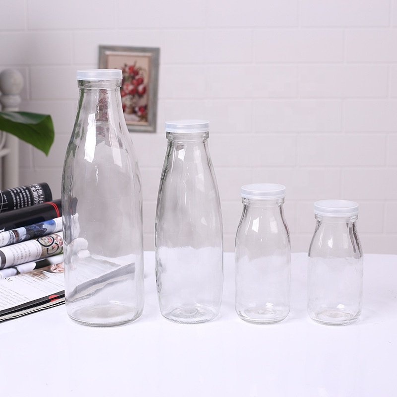 Wholesale Classic 200ml 250ml 500ml 1000ml Transparent Metal Lid Clear Milk Glass Bottle