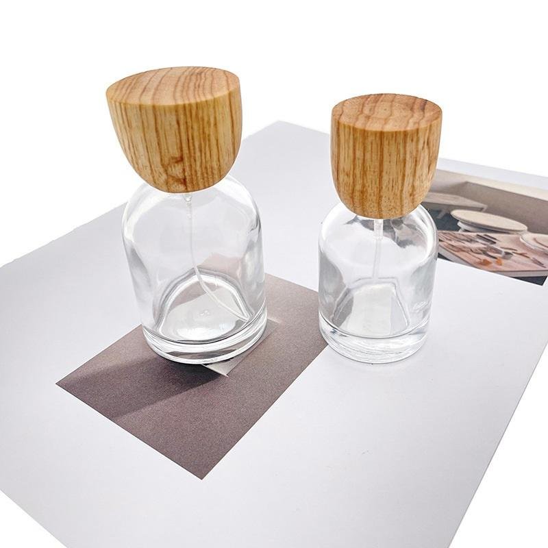 Crimp Perfume Bottle Round Spray Glass with Wooden Cap Factory Direct Wholesale Empty 30ml 50ml Cosmetic Packaging PUMP Sprayer