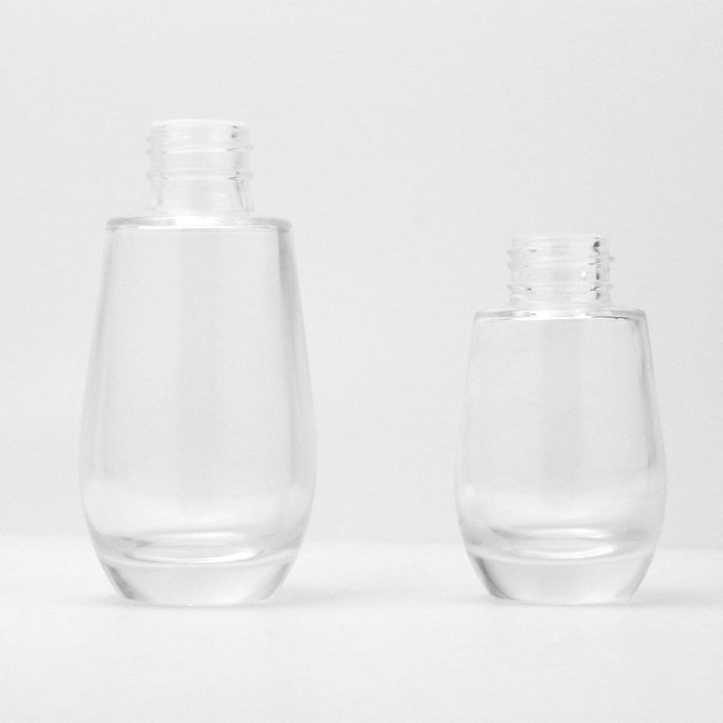 Luxury electroplated 30ml clear glossy white and gold drop shape thick base 50 ml serum dropper bottles silver top
