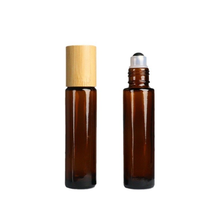 Hot selling 5ml 10ml bamboo roll on glass bottle frosted amber roll on perfume bottle for essential oil