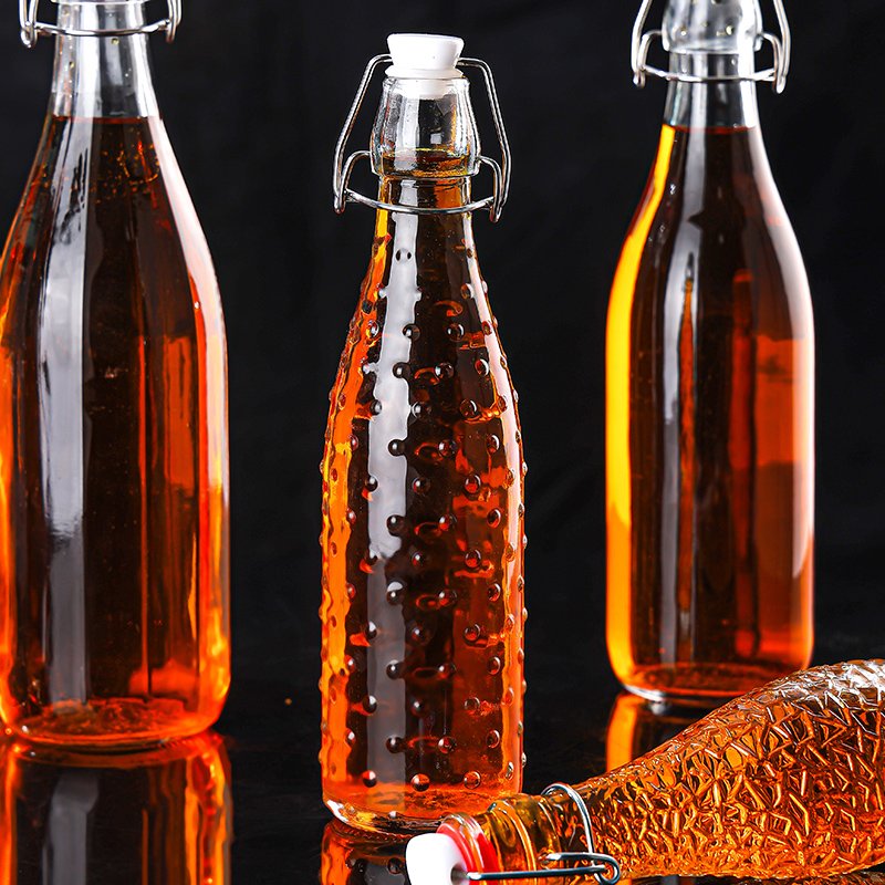Wholesale high quality 250ml 500ml 1000ml home brew Kombucha glass beer bottle with air tight line flip swing top lid