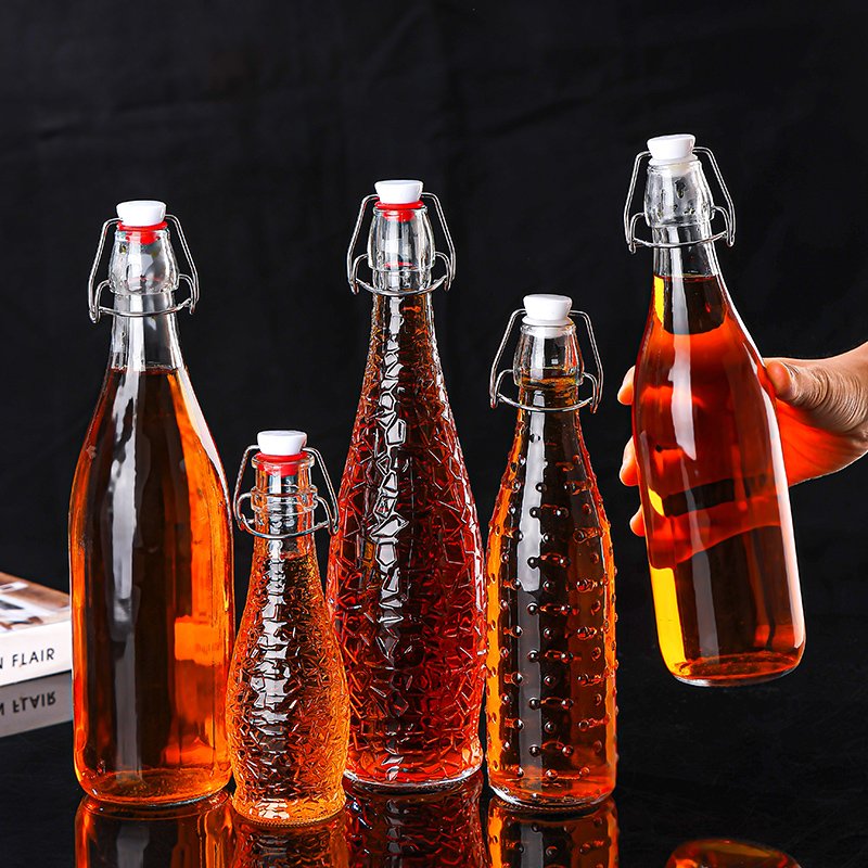 Wholesale high quality 250ml 500ml 1000ml home brew Kombucha glass beer bottle with air tight line flip swing top lid