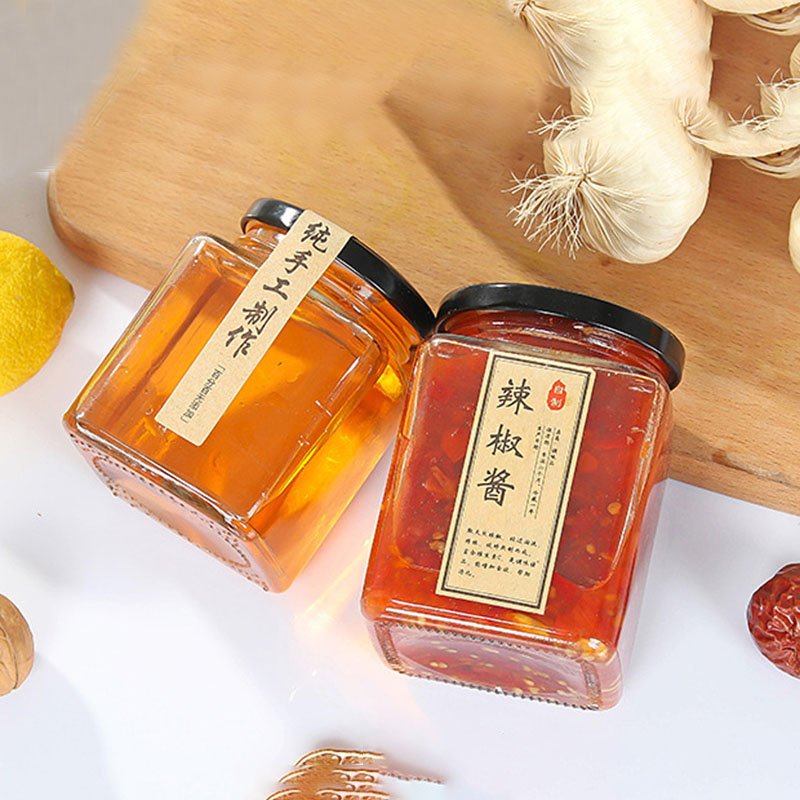 Classic clear square glass honey jar glass bottle with black metal lid for honey pickles canned jam