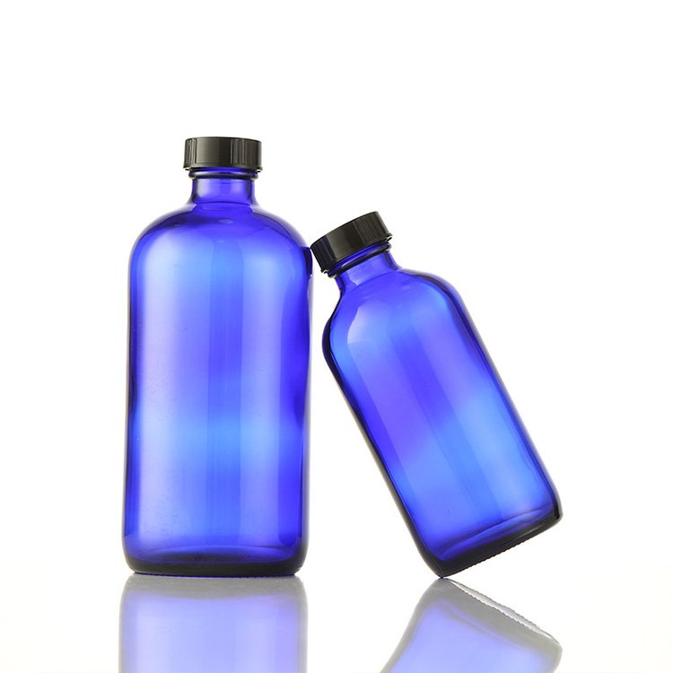 Factory 1oz 2oz 4oz 8oz 16oz 32oz Amber blue green clear boston round essential oil glass bottle with Black Poly Cap