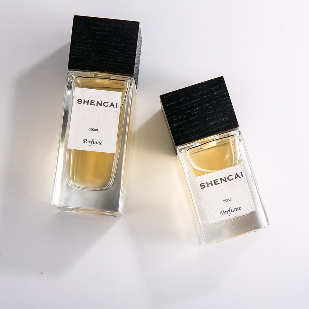 Luxury square spray perfume glass bottle 30ml 50ml wood covered glass perfume bottle
