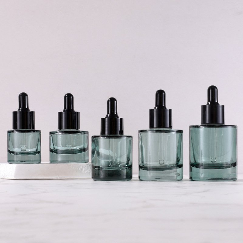 Wholesale Dark Green Oil Dropper Bottle 15ml 20ml 30ml 40ml 50ml Flat Shoulder Round Serum Glass Bottles With Dropper Cap
