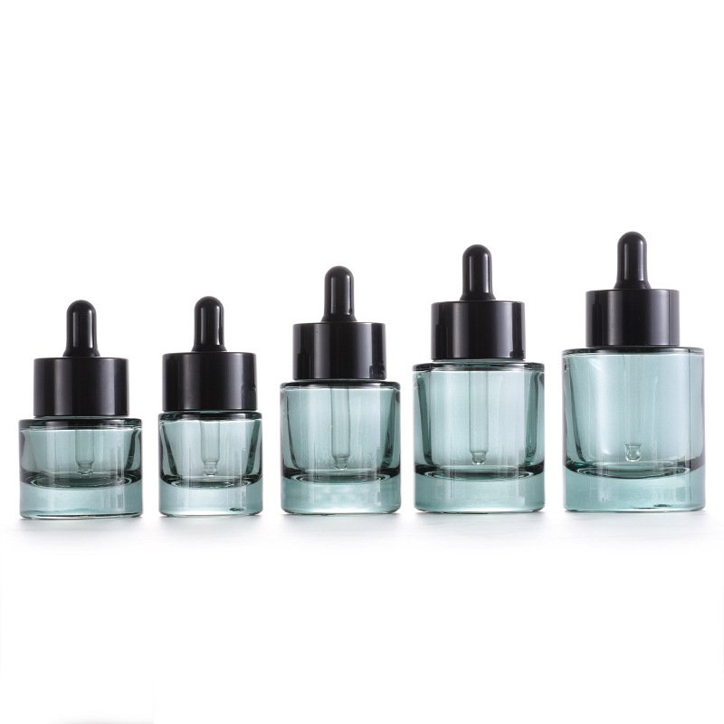 Wholesale Dark Green Oil Dropper Bottle 15ml 20ml 30ml 40ml 50ml Flat Shoulder Round Serum Glass Bottles With Dropper Cap