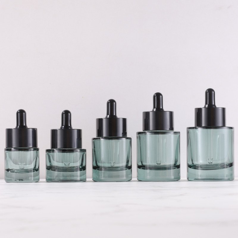Wholesale Dark Green Oil Dropper Bottle 15ml 20ml 30ml 40ml 50ml Flat Shoulder Round Serum Glass Bottles With Dropper Cap