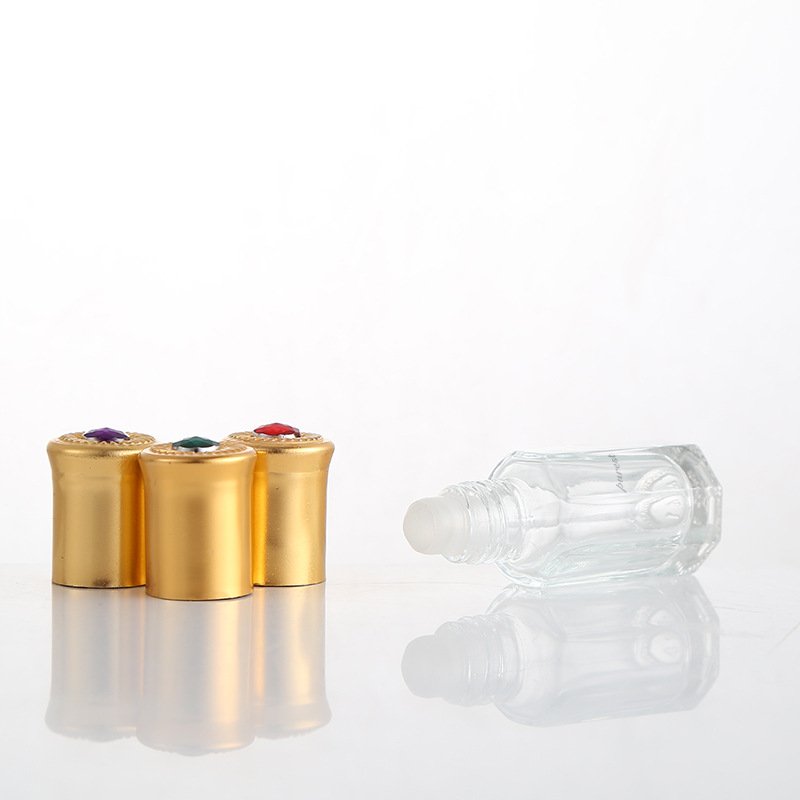 3ml Octagonal Perfume Essential Oil Glass Roll On Attar Bottle Clear With Golden Plated Cap pasted with colorful beads