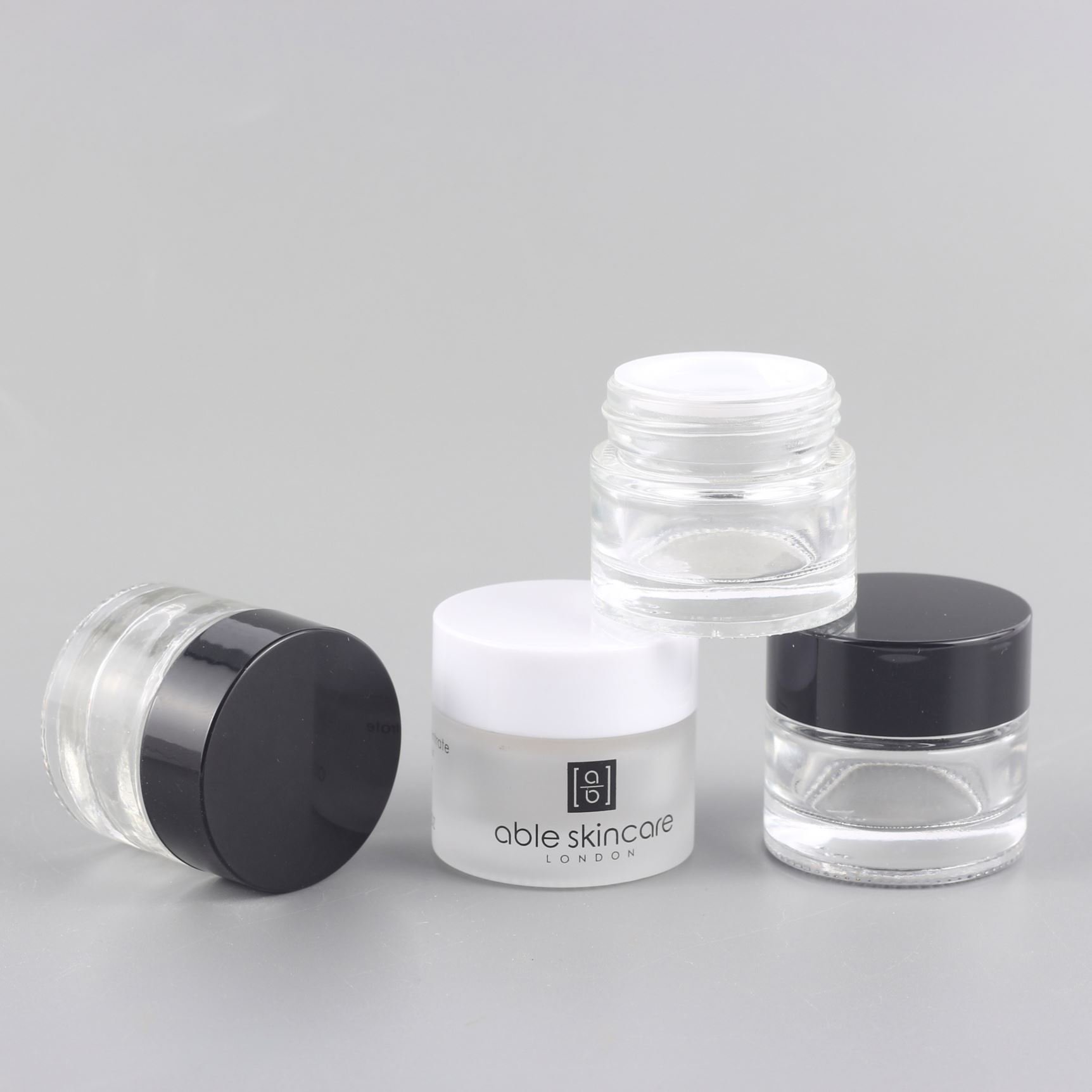 China wholesale regular appearance frosted eye cream glass bottle in stock cylindrical glass cream jar 10g