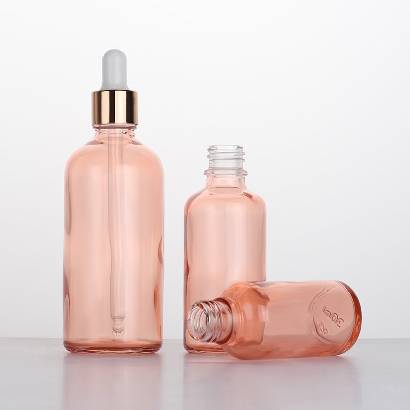 Luxury 0.5oz 1oz 2 oz 10ml 15ml 20ml 30ml 50ml 100ml pink essential oil facial serum glass dropper bottle with rose gold caps