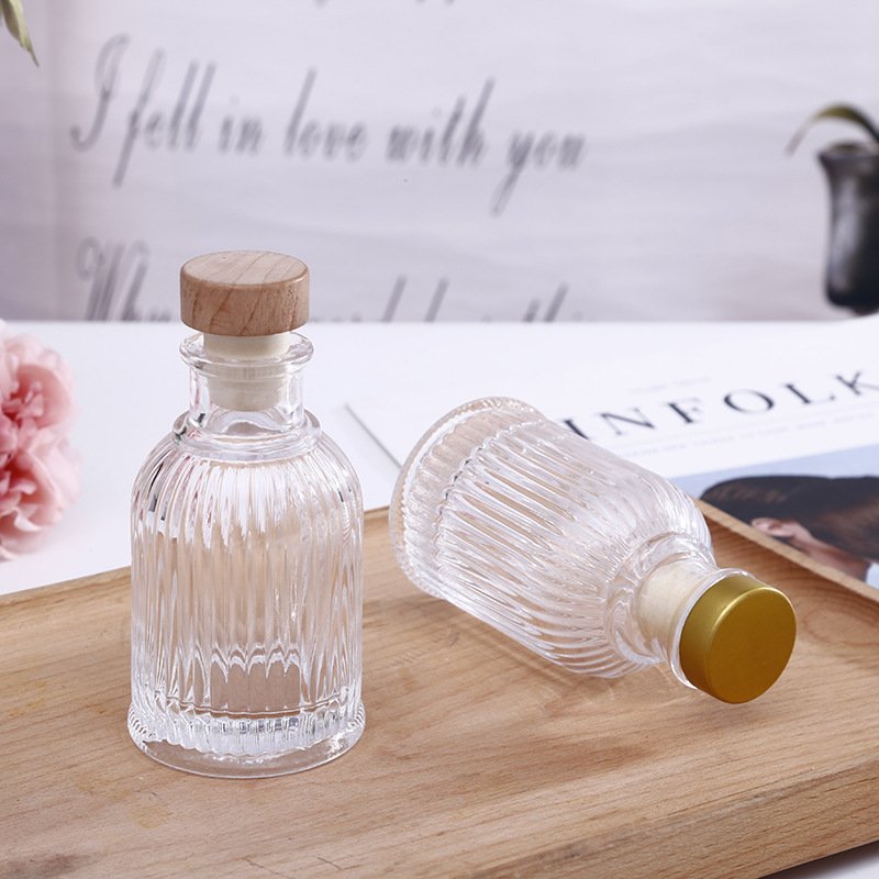 wholesale no fire room aroma bottle glass 100ml fragrance diffuser glass bottle with aluminum cap and rattan sticks