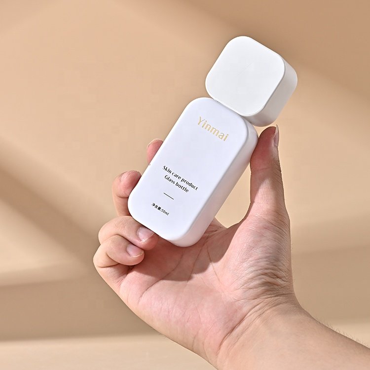 Yinmai 30 50 100 120ml 30G 50G custom empty luxury thick bottom skincare packaging set glass cosmetic pump bottle and cream jar