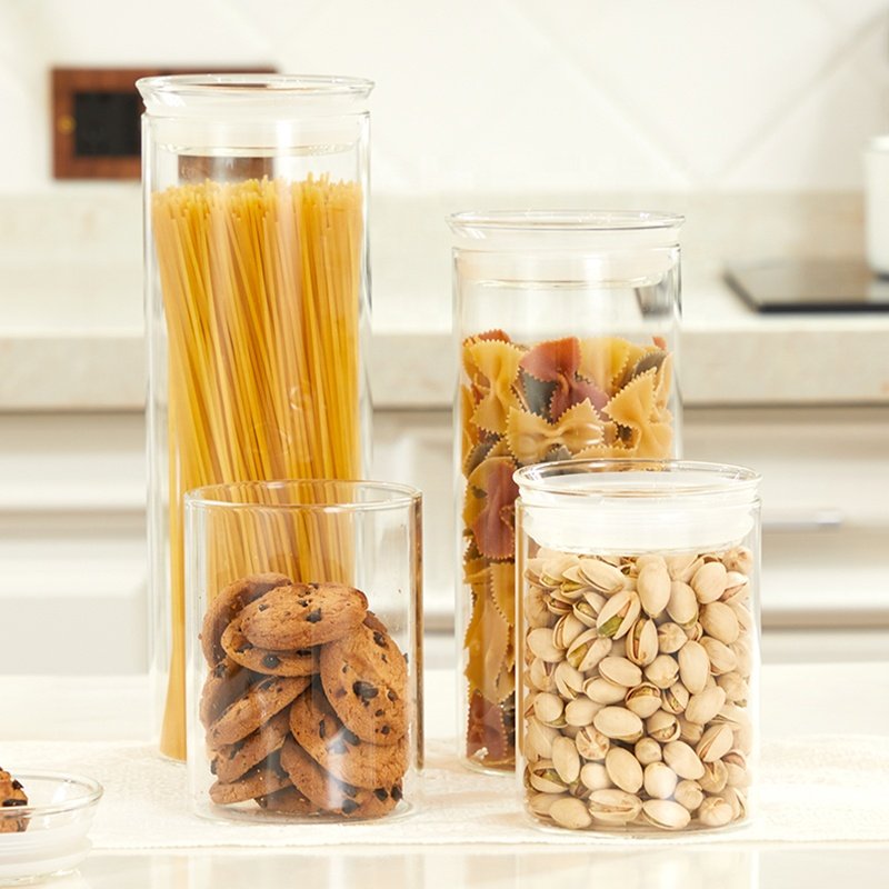 Cylindric glass jars with sealing rings and glass LIDS for kitchen storage