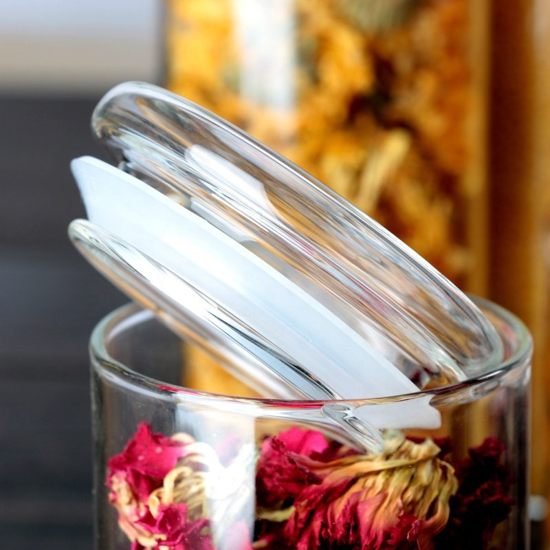 Cylindric glass jars with sealing rings and glass LIDS for kitchen storage