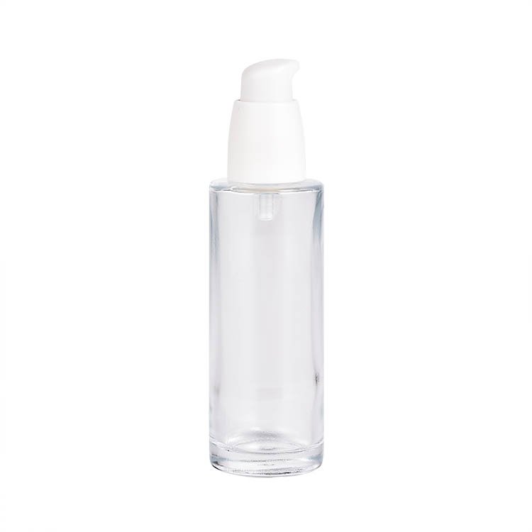 Hot sale empty glass liquid cosmetic container/foundation bottle/cream lotion glass bottle with press pump cap