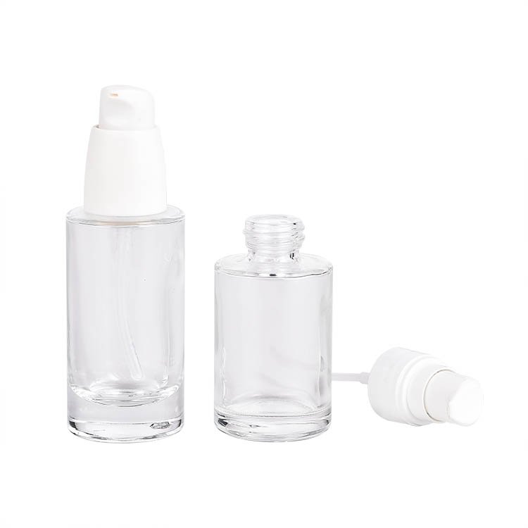 Hot sale empty glass liquid cosmetic container/foundation bottle/cream lotion glass bottle with press pump cap
