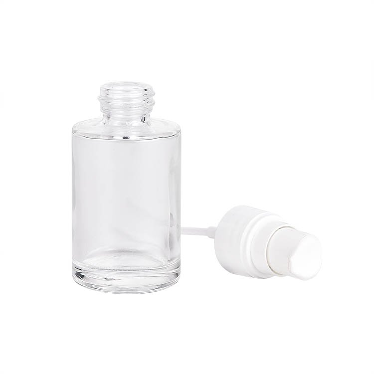 Hot sale empty glass liquid cosmetic container/foundation bottle/cream lotion glass bottle with press pump cap