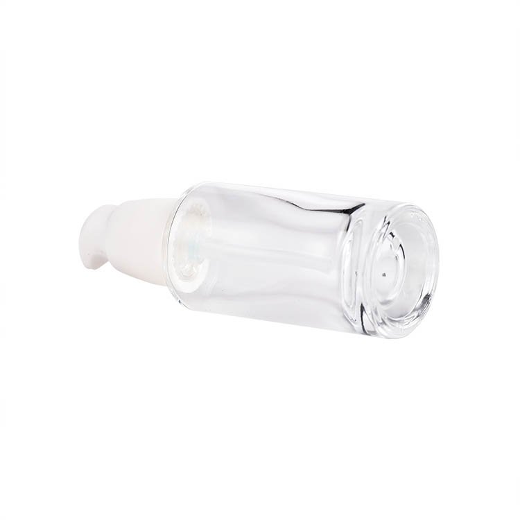Hot sale empty glass liquid cosmetic container/foundation bottle/cream lotion glass bottle with press pump cap