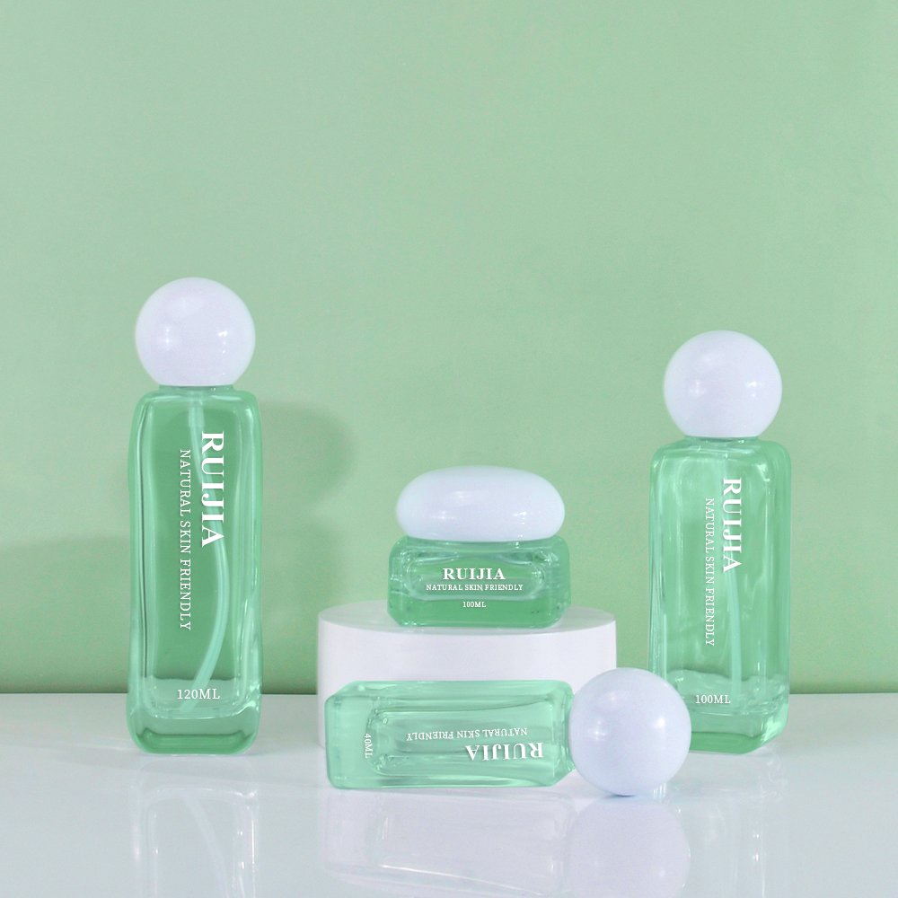 2014 New luxury cosmetic packaging glass bottle set 50g 40ml 50ml 100ml 120ml skincare cream jar and serum pump spray bottle set