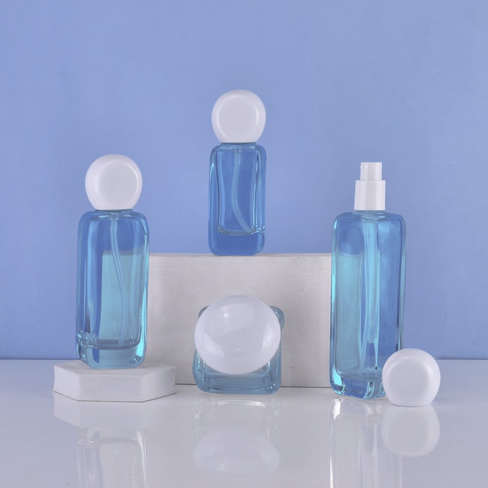 2014 New luxury cosmetic packaging glass bottle set 50g 40ml 50ml 100ml 120ml skincare cream jar and serum pump spray bottle set