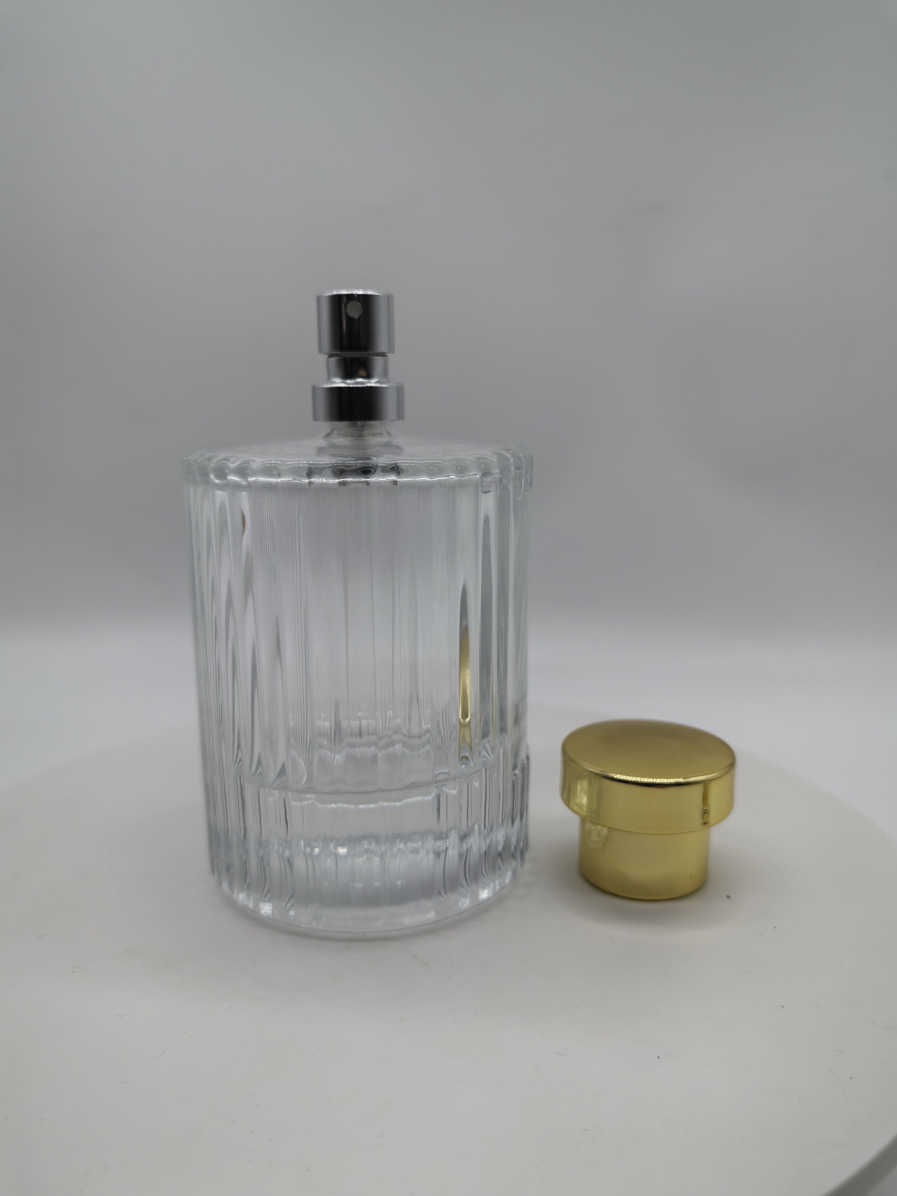 hot sale empty luxury 30ml 50ml 100ml FEA crimping pump clear fragrance all aluminum mist spray with cap perfume glass bottle