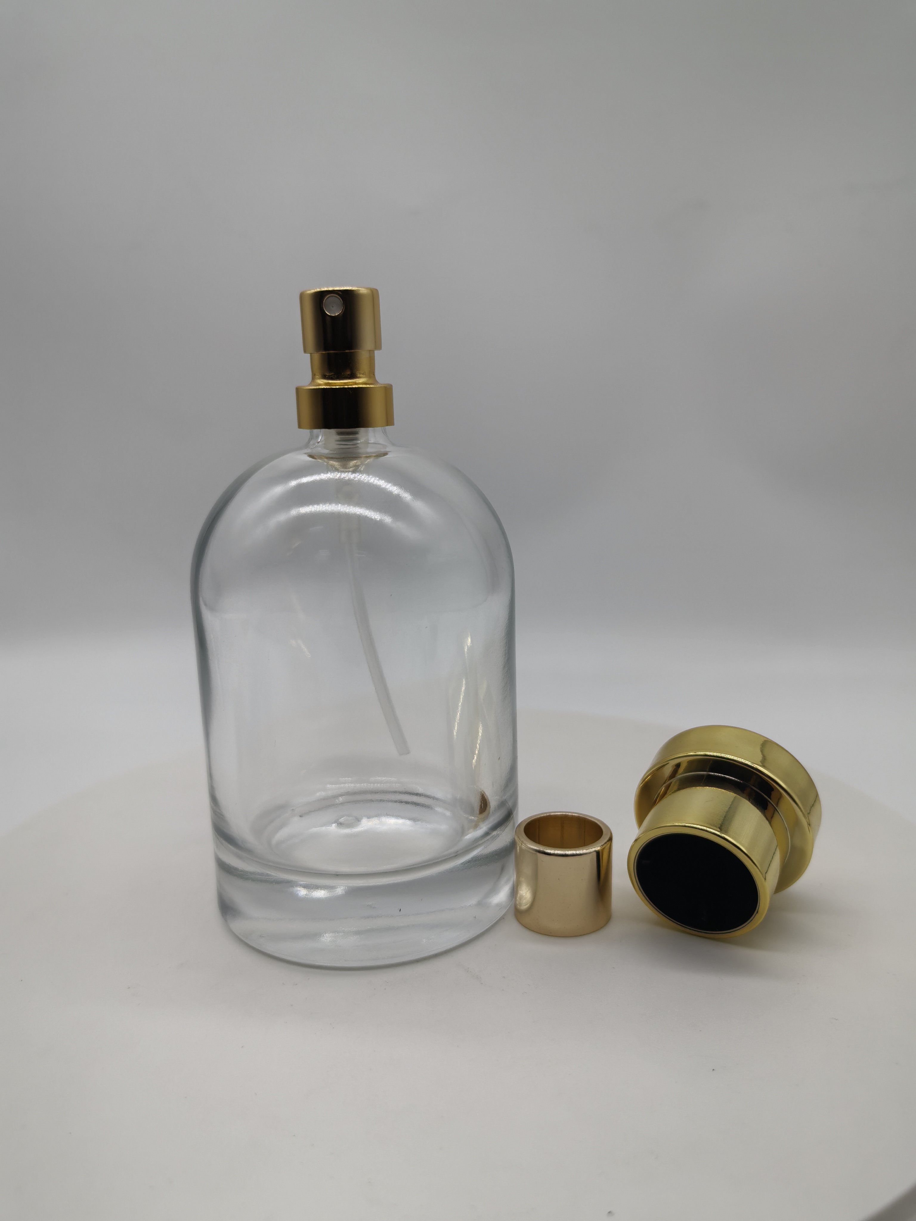 hot sale empty luxury 30ml 50ml 100ml FEA crimping pump clear fragrance all aluminum mist spray with cap perfume glass bottle