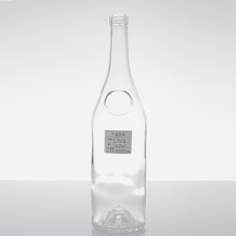 Wholesale Low Moq Packaging 500ml 750ml transparent super flint round shape liquor Vodka glass bottle with cork cap