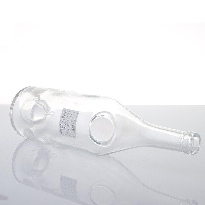 Wholesale Low Moq Packaging 500ml 750ml transparent super flint round shape liquor Vodka glass bottle with cork cap