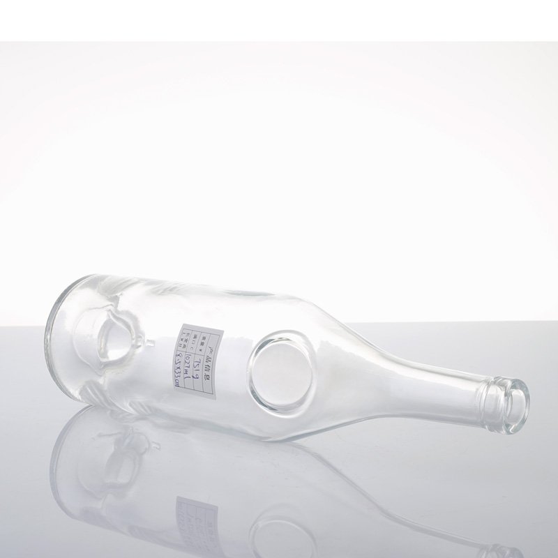 Wholesale Low Moq Packaging 500ml 750ml transparent super flint round shape liquor Vodka glass bottle with cork cap