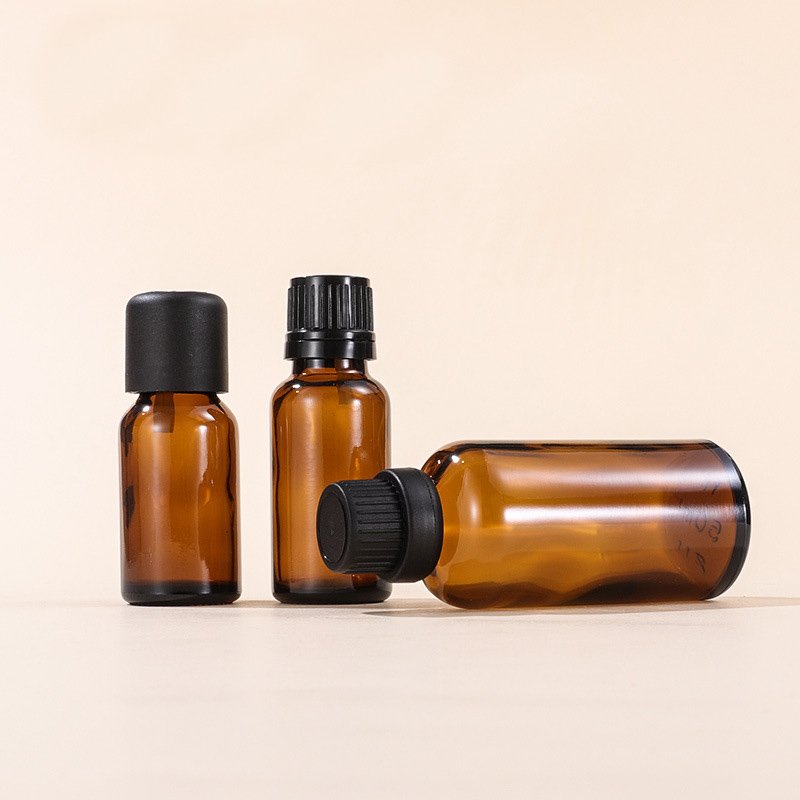 Customized Logo 5ml/10ml/15ml/20ml/30ml/50ml/100ml Essential Oil Cosmetic Amber Glass Bottle With Long Inner Plug