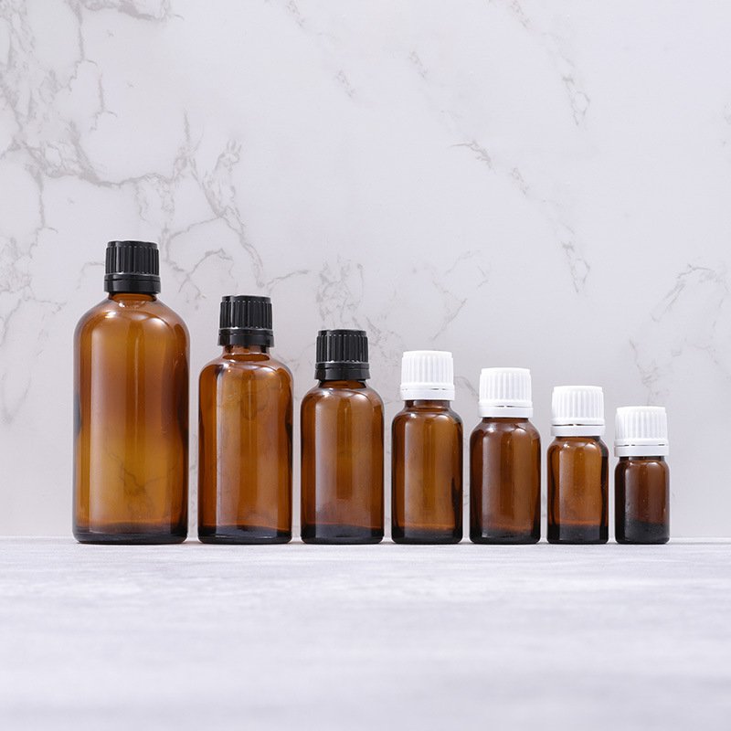 Customized Logo 5ml/10ml/15ml/20ml/30ml/50ml/100ml Essential Oil Cosmetic Amber Glass Bottle With Long Inner Plug