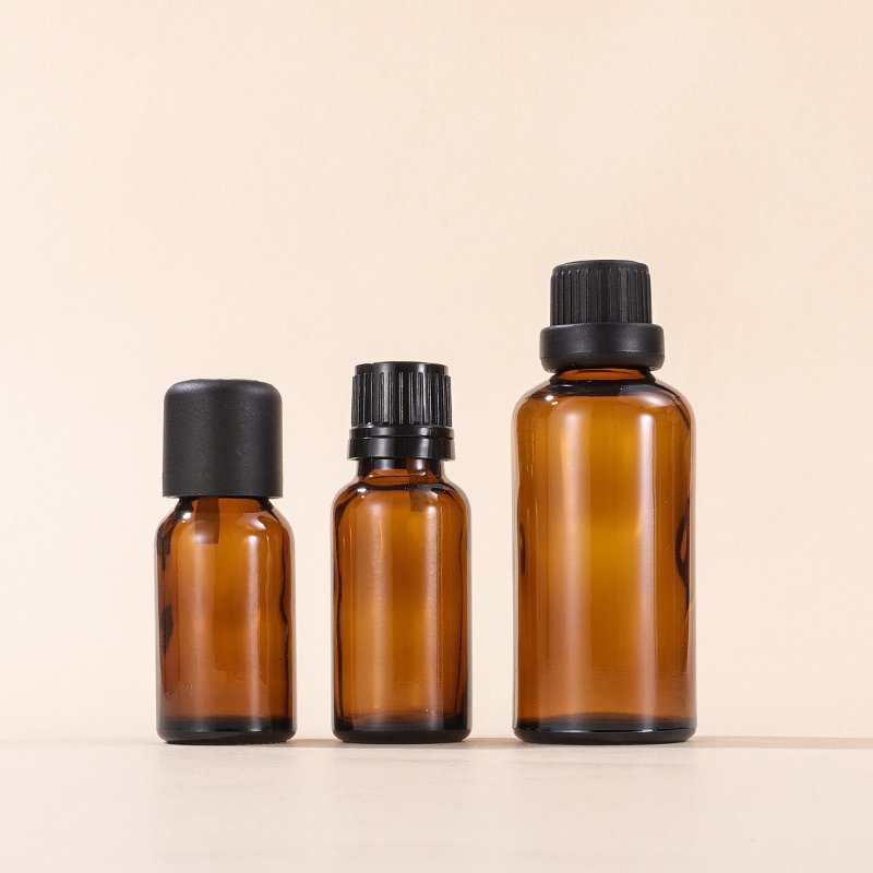 Customized Logo 5ml/10ml/15ml/20ml/30ml/50ml/100ml Essential Oil Cosmetic Amber Glass Bottle With Long Inner Plug
