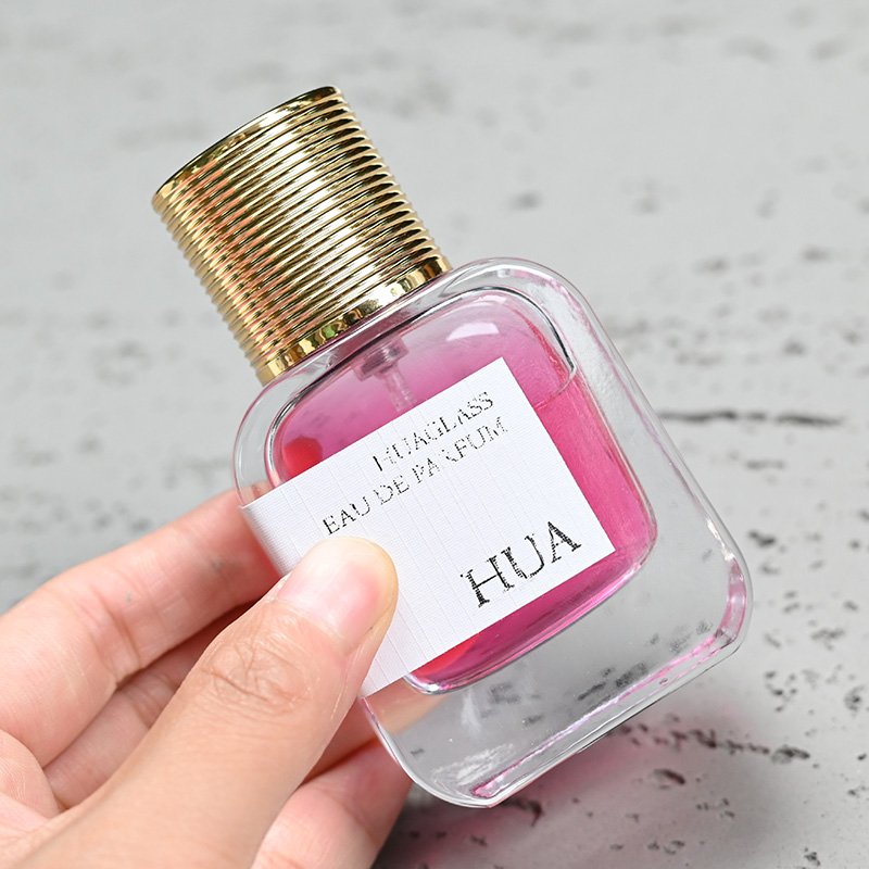 Popular round shoulder 30ml 50ml 100ml vintage italian perfume bottle empty glass bottle round with gold silver lid