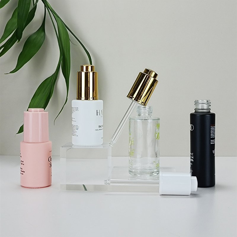 Custom 30ml 50ml 100ml cosmetic packaging serum oil container essential oil glass dropper bottle