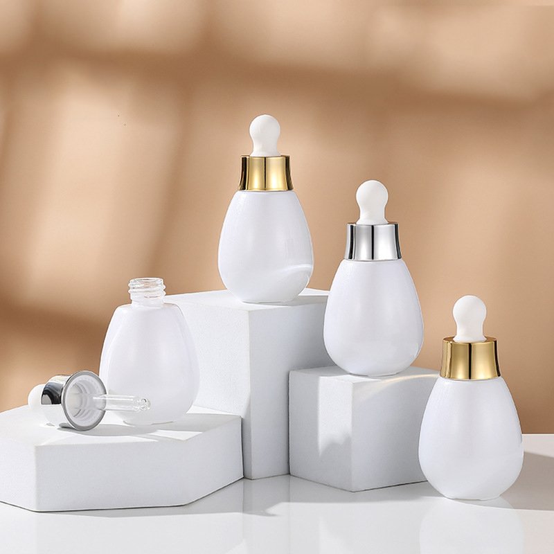 Wholesale OEM ODM Skincare Clear Essential Oil Dropper Bottle 30ml Cute Glass Round Serum Dropper Bottle Packaging