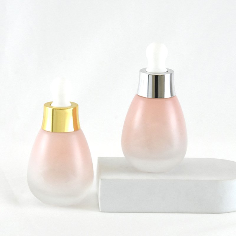 Wholesale OEM ODM Skincare Clear Essential Oil Dropper Bottle 30ml Cute Glass Round Serum Dropper Bottle Packaging