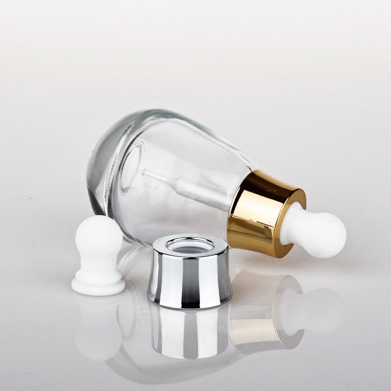 Wholesale OEM ODM Skincare Clear Essential Oil Dropper Bottle 30ml Cute Glass Round Serum Dropper Bottle Packaging