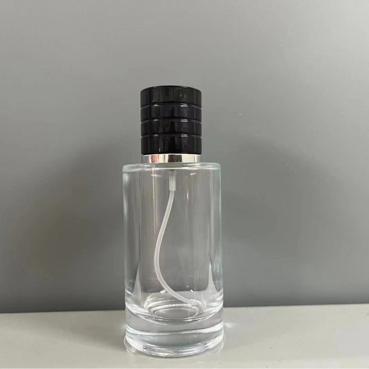 Empty Round Cylinder Shape 30ML 50ML Transparent Perfume Glass Bottle Spray Bottle Refillable