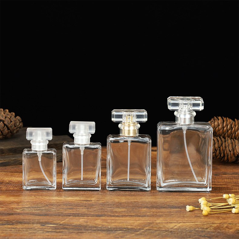 Spot supply Luxury Recyclable 20ml 30ml 50ml 100ml Transparent Square Glass Perfume Bottle With Pump Spray Cap