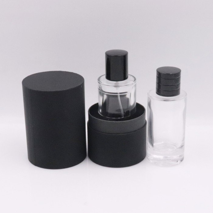 cylinder 50ml glass perfume bottle packaging 50ml 100ml Round Cylinder Transparent Spray Glass Perfume Bottle