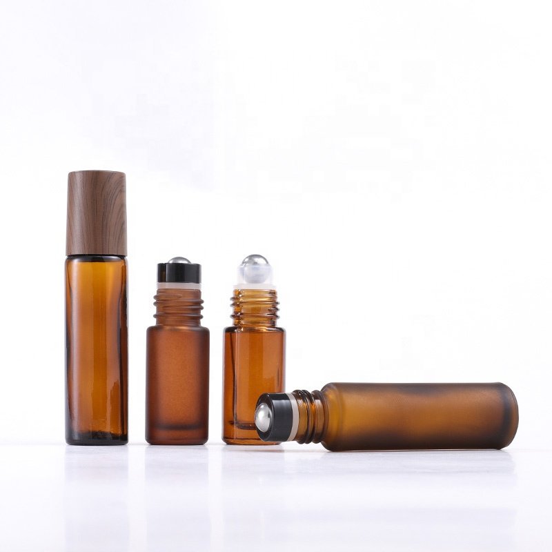 5ml 10ml matte amber glass bottles dark wood bamboo lids stainless steel roller ball refillable essential oil roll on bottle