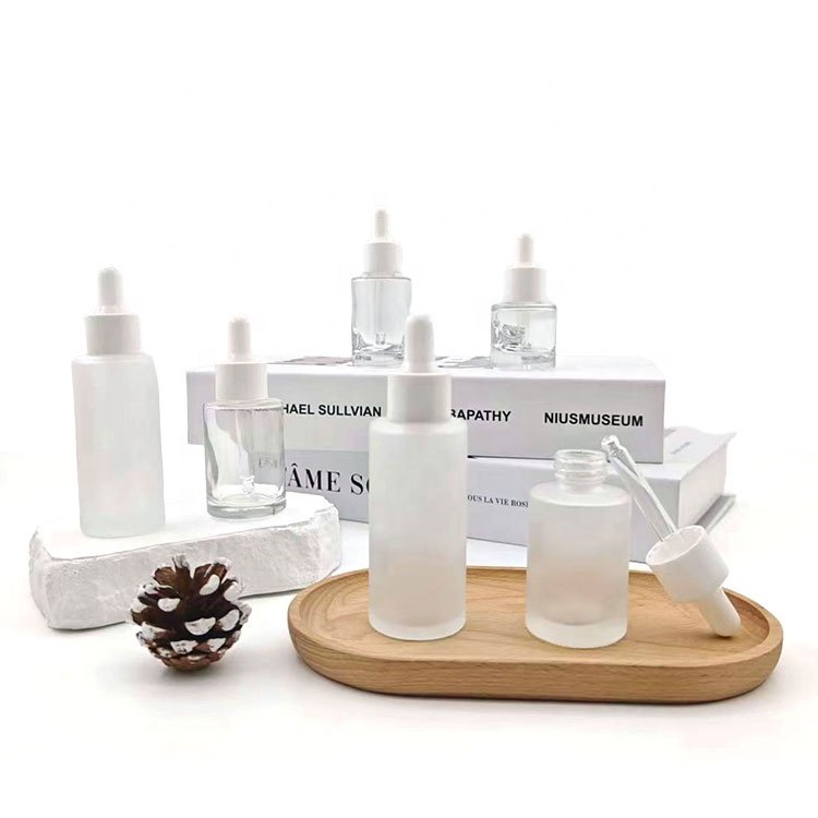 30 ml 15ml 50ml printed elegant white dropper serum bottles stock 50 ml round frosted glass empty bottle with rubber dropper