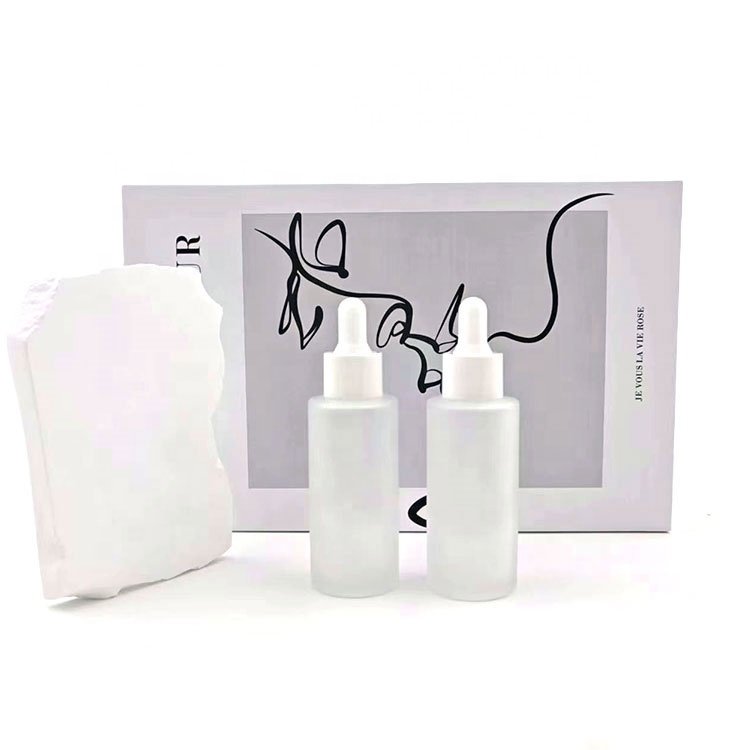 30 ml 15ml 50ml printed elegant white dropper serum bottles stock 50 ml round frosted glass empty bottle with rubber dropper