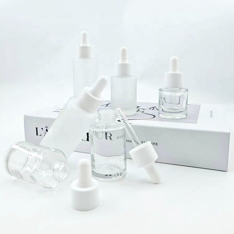 30 ml 15ml 50ml printed elegant white dropper serum bottles stock 50 ml round frosted glass empty bottle with rubber dropper
